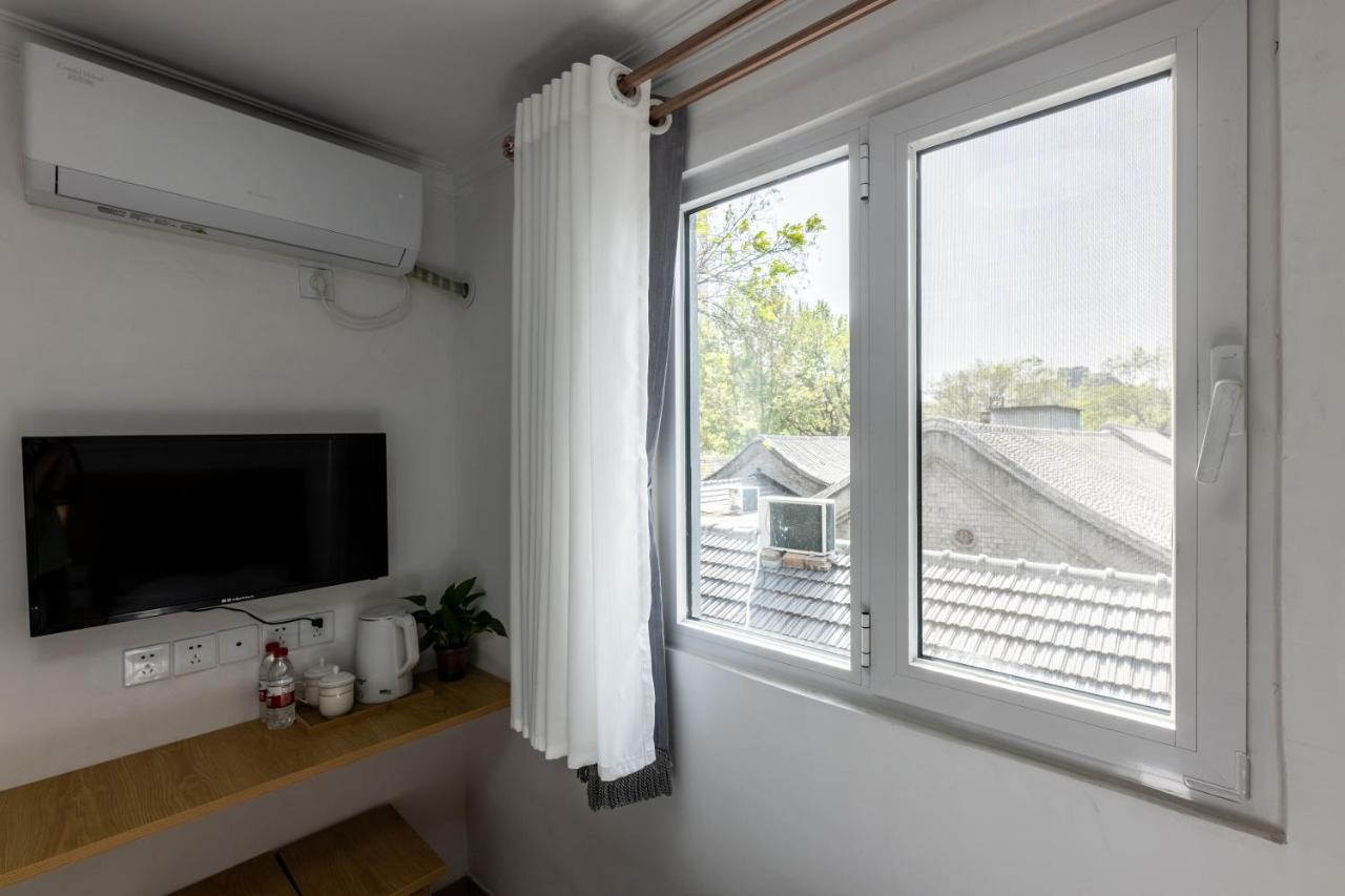 Happy Dragon Hotel -- Nearby Tiananmen Square & Forbidden City & Wangfujing Street & Line 5,6,8 Subway Nearby & Free Coffee & Free Laundry & Fluent English Speaking & Tourist Attractions Ticket Service & Free Wifi Unlimited For Western Software Beijing Eksteriør bilde